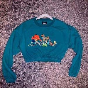 Dark teal cropped sweater of the Tune Squad from Space Jam: New Legacy